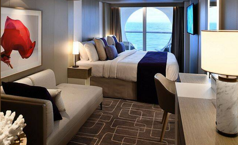 Cabine de luxe à balcon avec vue sur mer – Vue réduite – [2A]