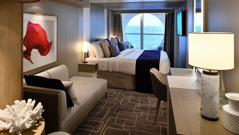 Cabine de luxe avec vue par hublot et véranda – [1B]